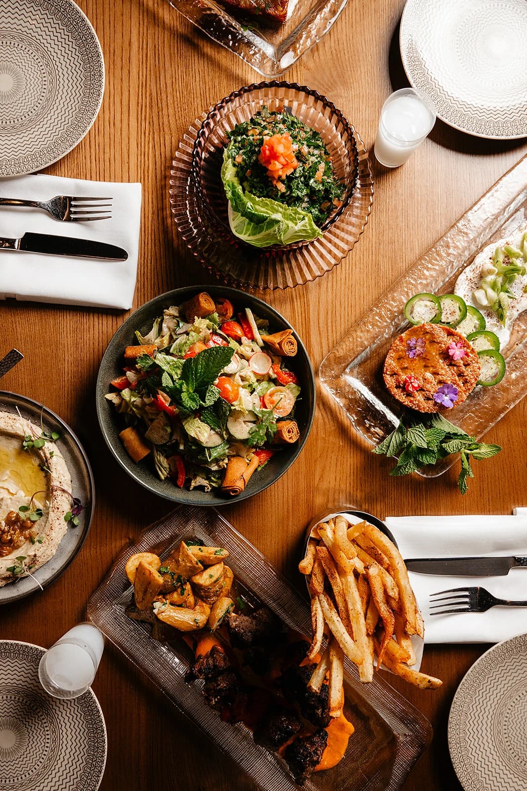 A shared table set for the Bey Mediterranean five-course wine dinner